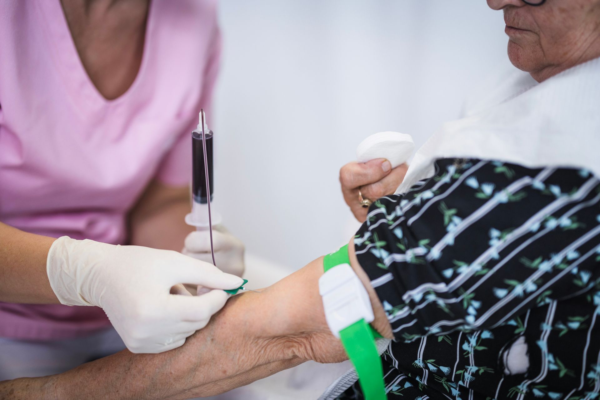 Nurse Drawing Blood from Vein of a Patient in the Clinic — Orlando, FL — Central Florida Kidney Specialists