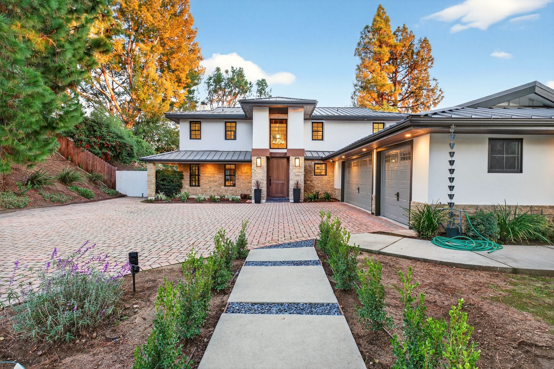 Early twilight view of front entrance.