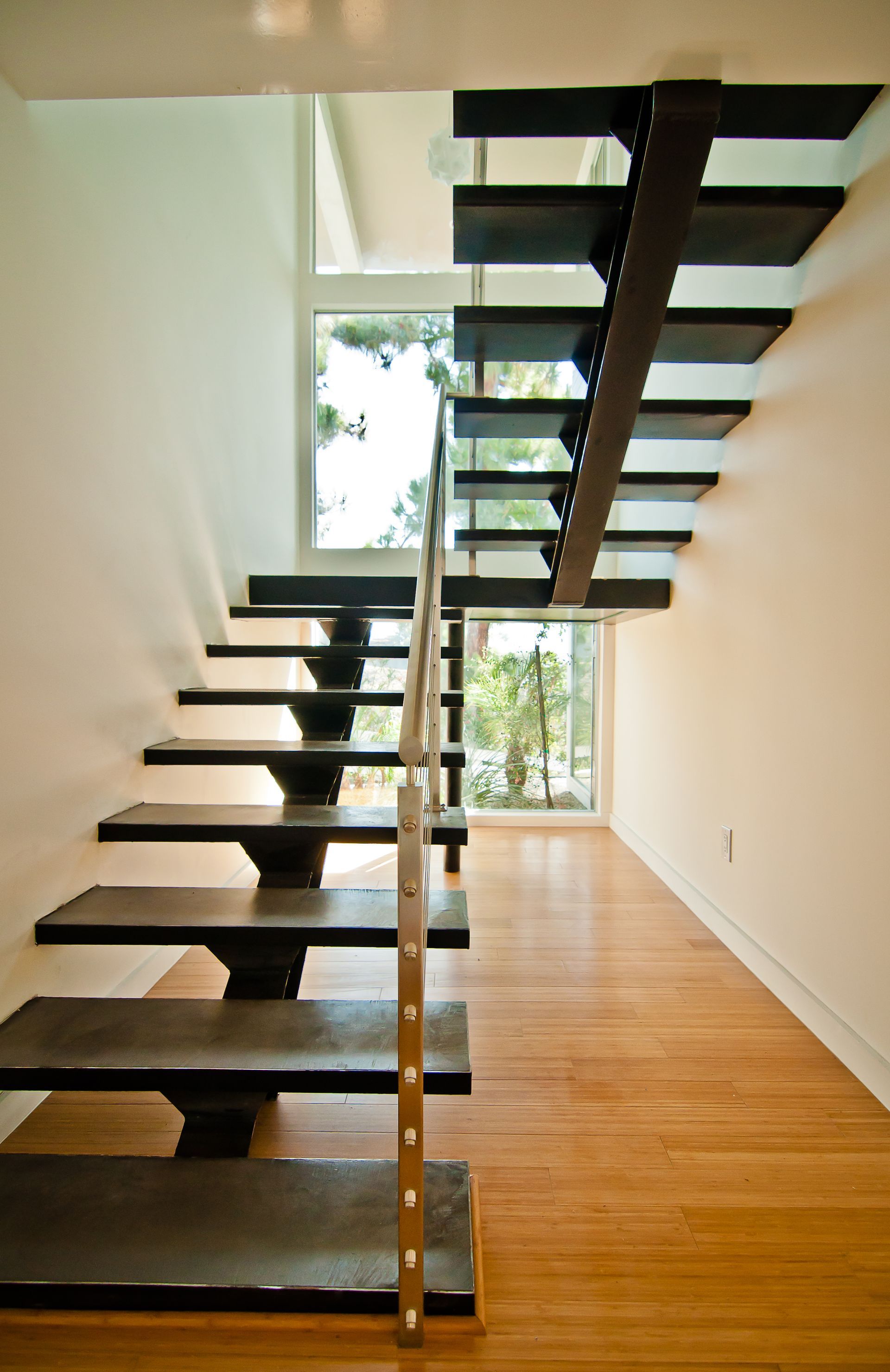A staircase leading up to the second floor of a house