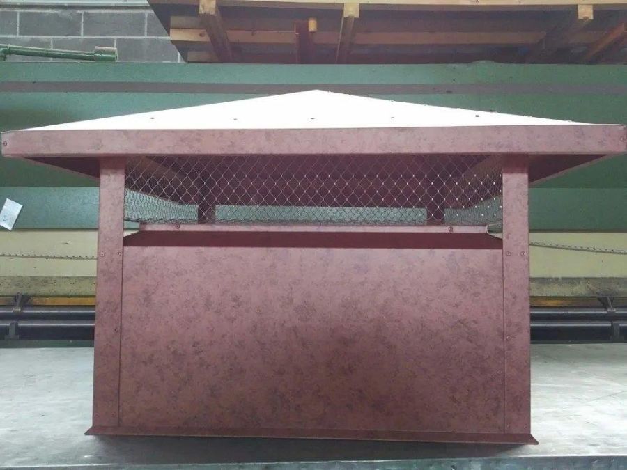 camino in acciaio e rame