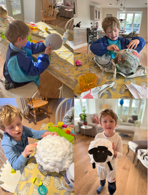 Boy making sheep craft at a table, progressing from parts to finished product, indoors.