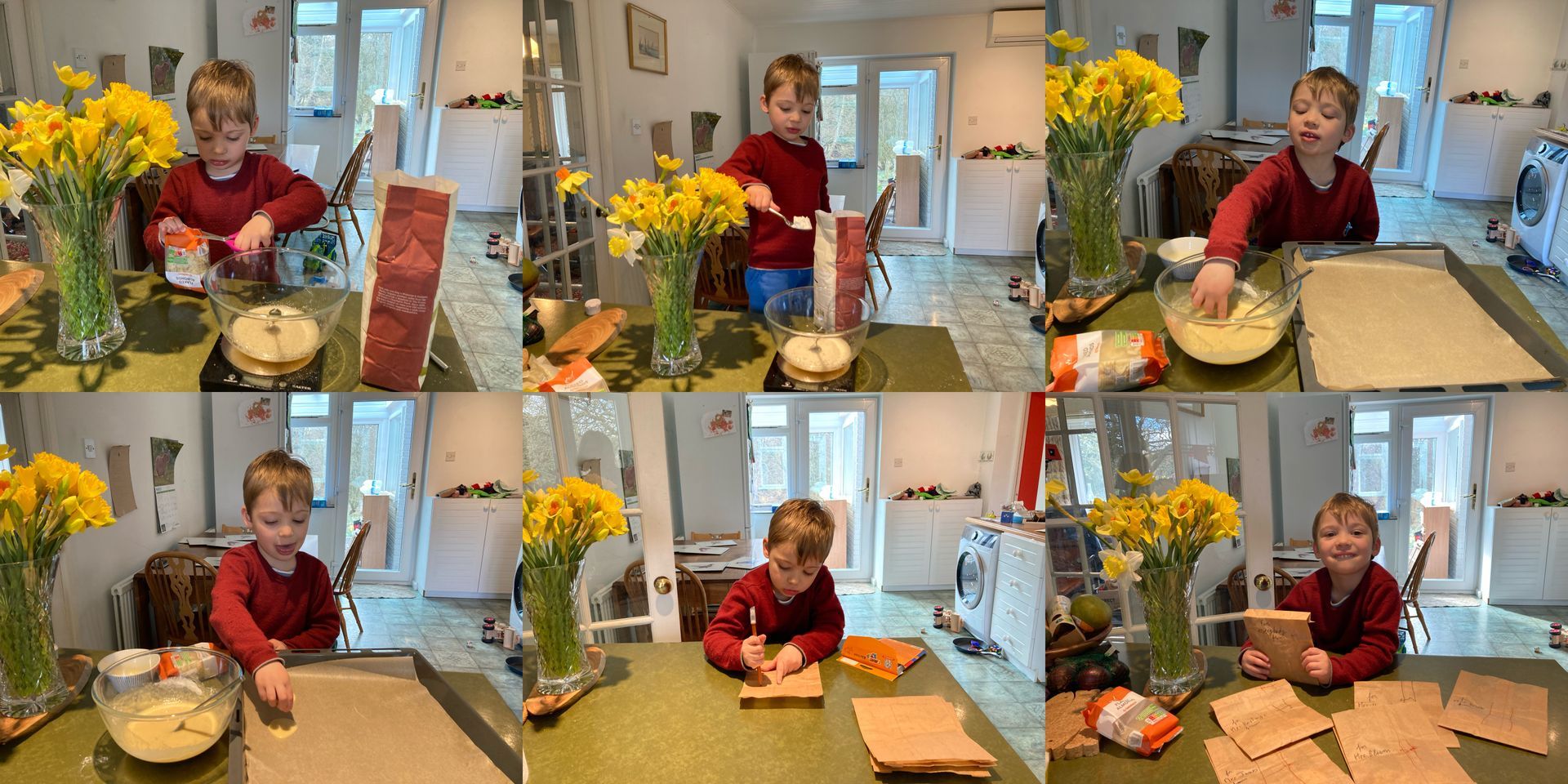 A child in a red shirt bakes cookies in a kitchen, smiling as they work with a cookie sheet and other ingredients.