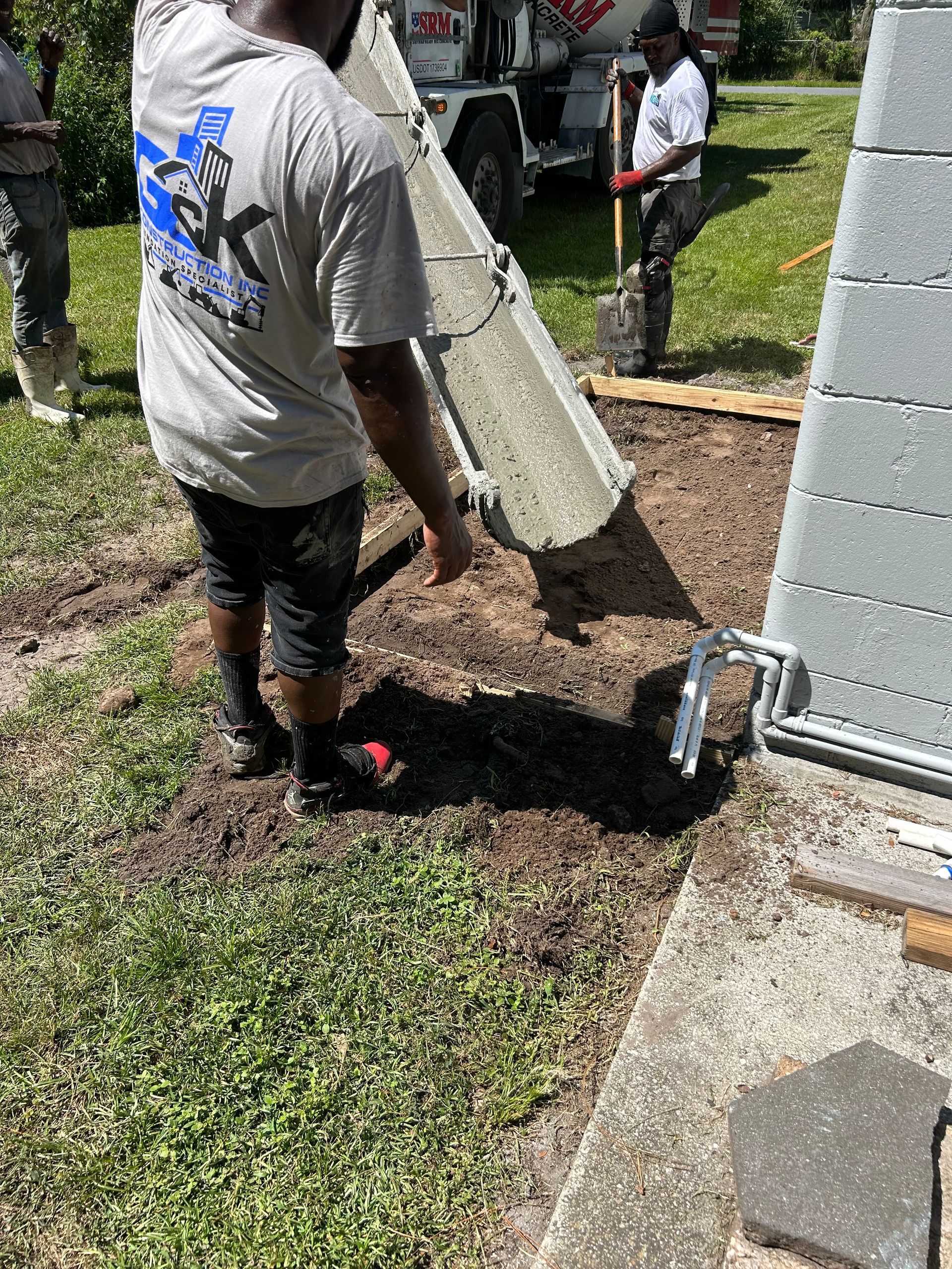 Men Working At Backyard — Jacksonville, FL — G -K Construction