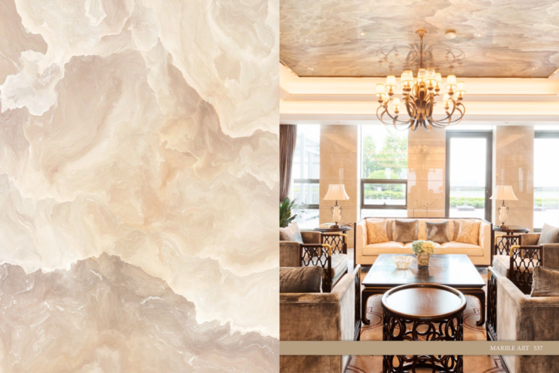 A living room with a chandelier , couch , table and chairs.