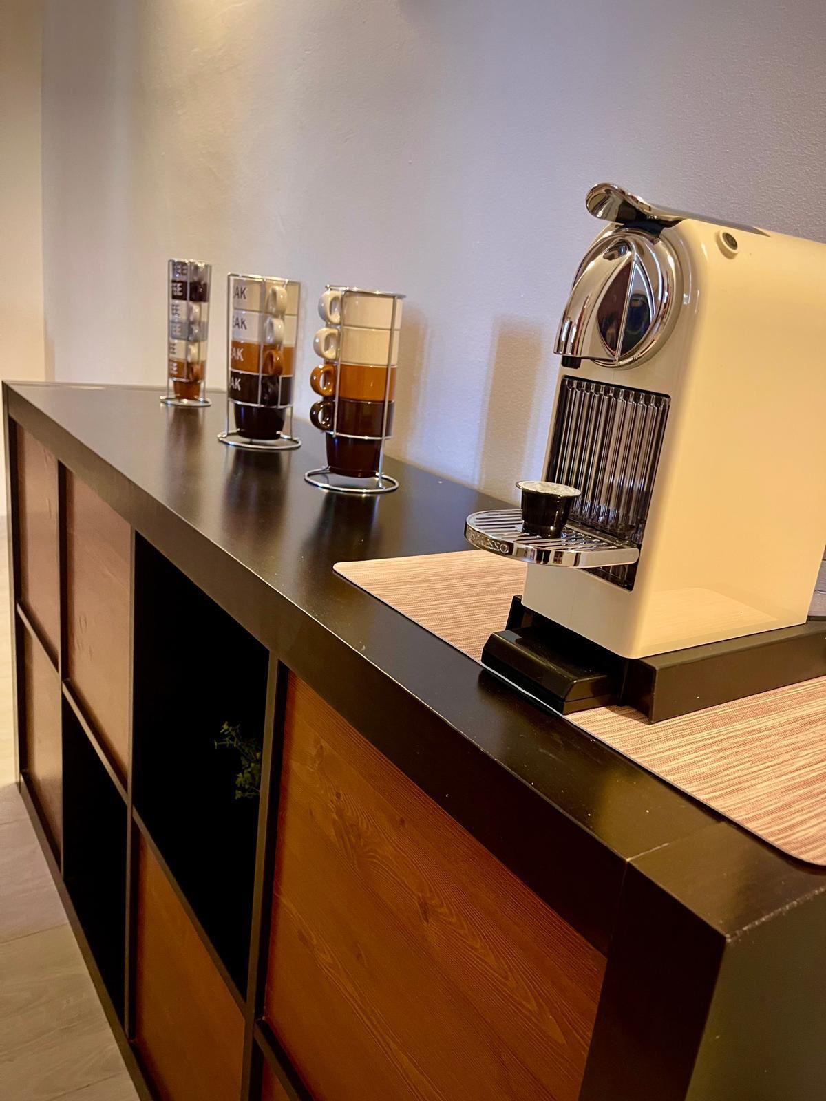 macchina da caffè e capsule