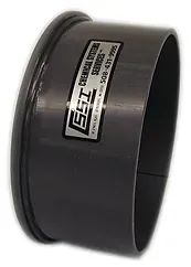 A close up of a rubber ring with a sticker on it on a white background.