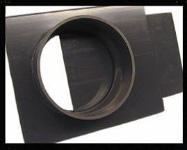 A close up of a piece of metal with a hole in the middle.