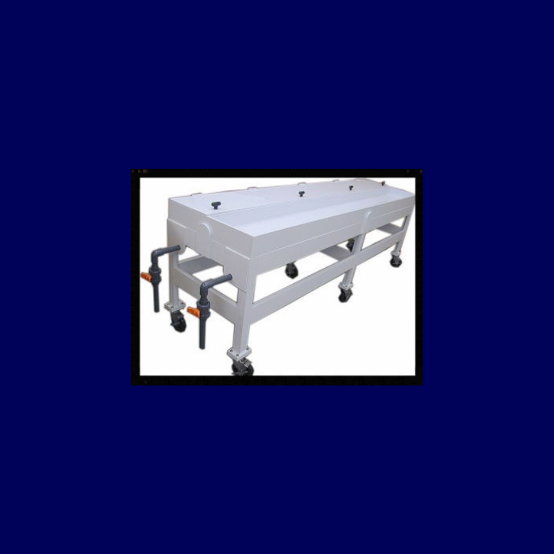 A white table with wheels and a blue background