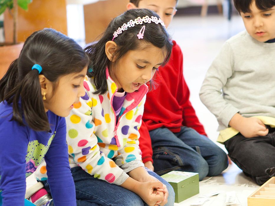 Montessori children working in the classroom