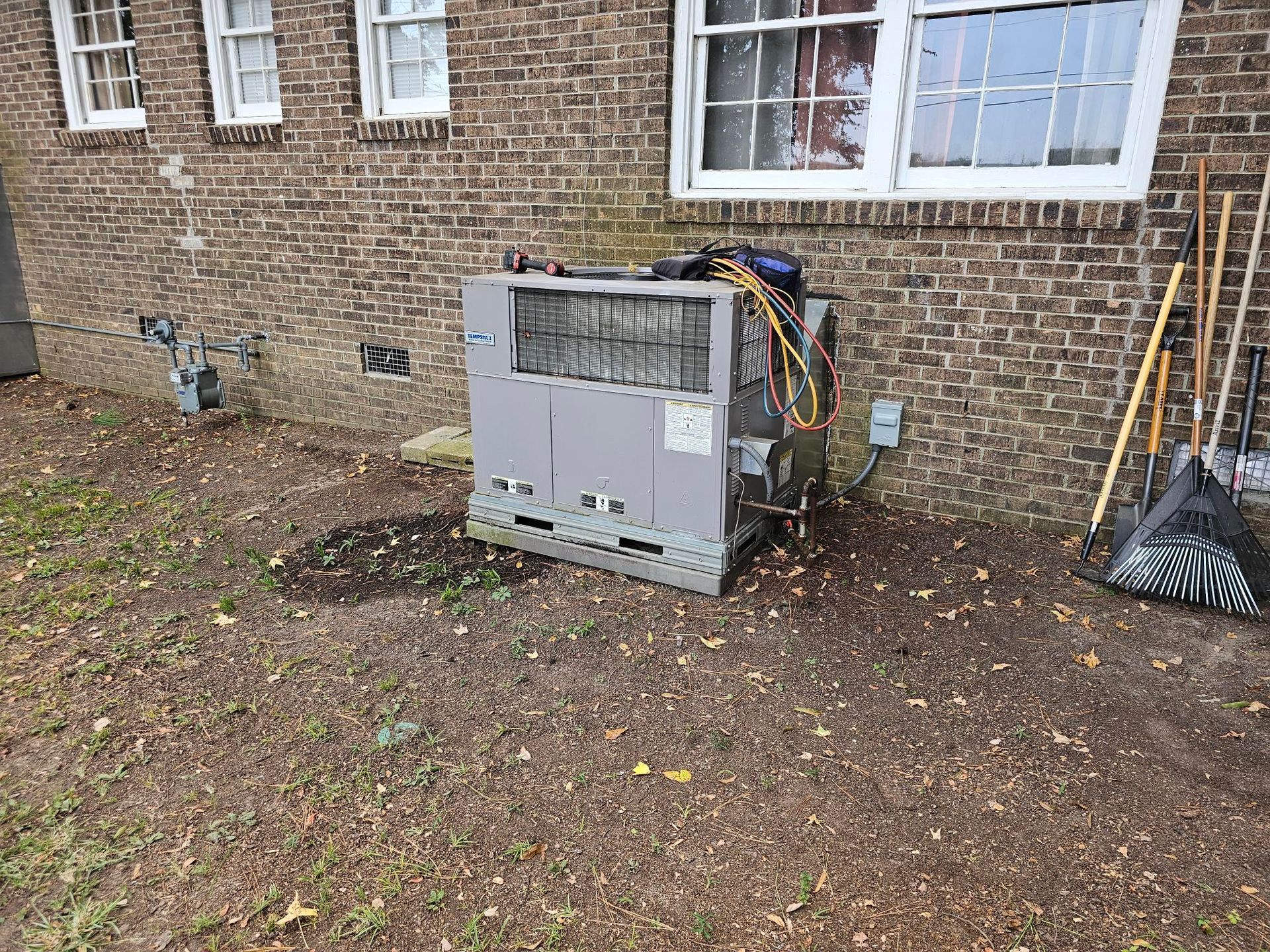 Nice HVAC Unit Next to House — Winnsboro, SC — Joe Burns Heating and Air
