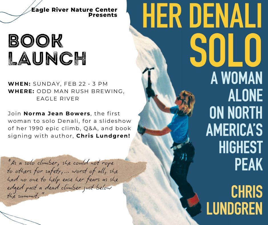 There is a bridge over a river with mountains in the background.