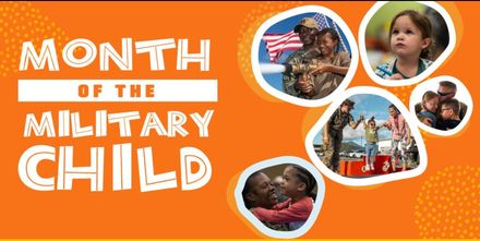 A man is standing on top of a mountain next to a boat.