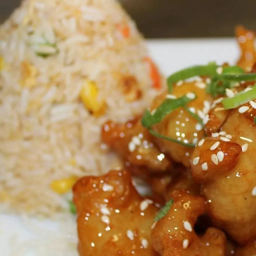 Fried Rice and Orange Chicken, Close-up Shot — L'il Buddha Asian Cuisine in Salamander Bay, NSW