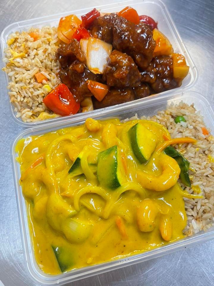 Two plastic containers of Chinese food: sweet and sour pork, curry with vegetables, and fried rice— L'il Buddha Asian Cuisine in Salamander Bay, NSW