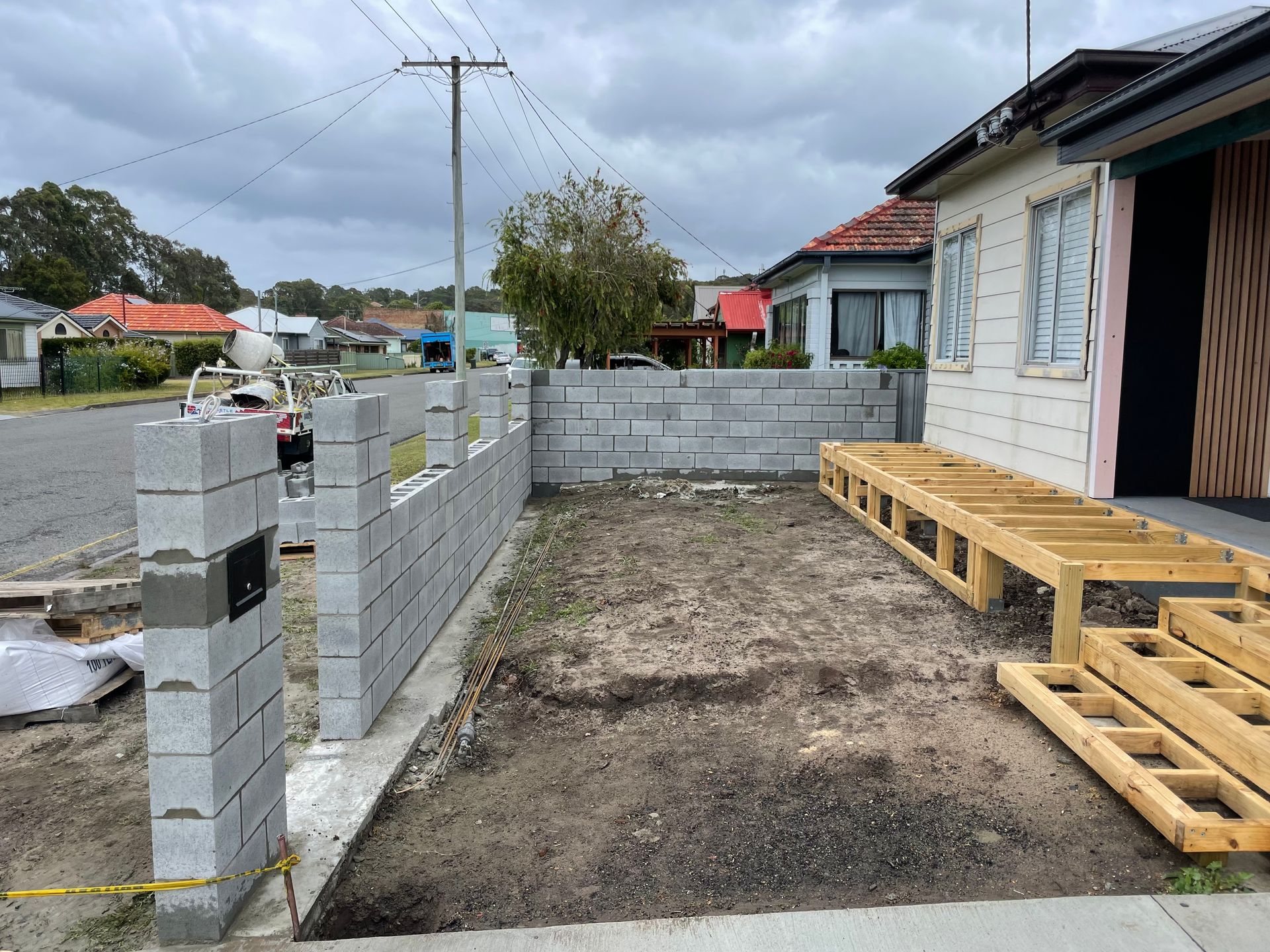 A large brick building with a lot of windows is being built.