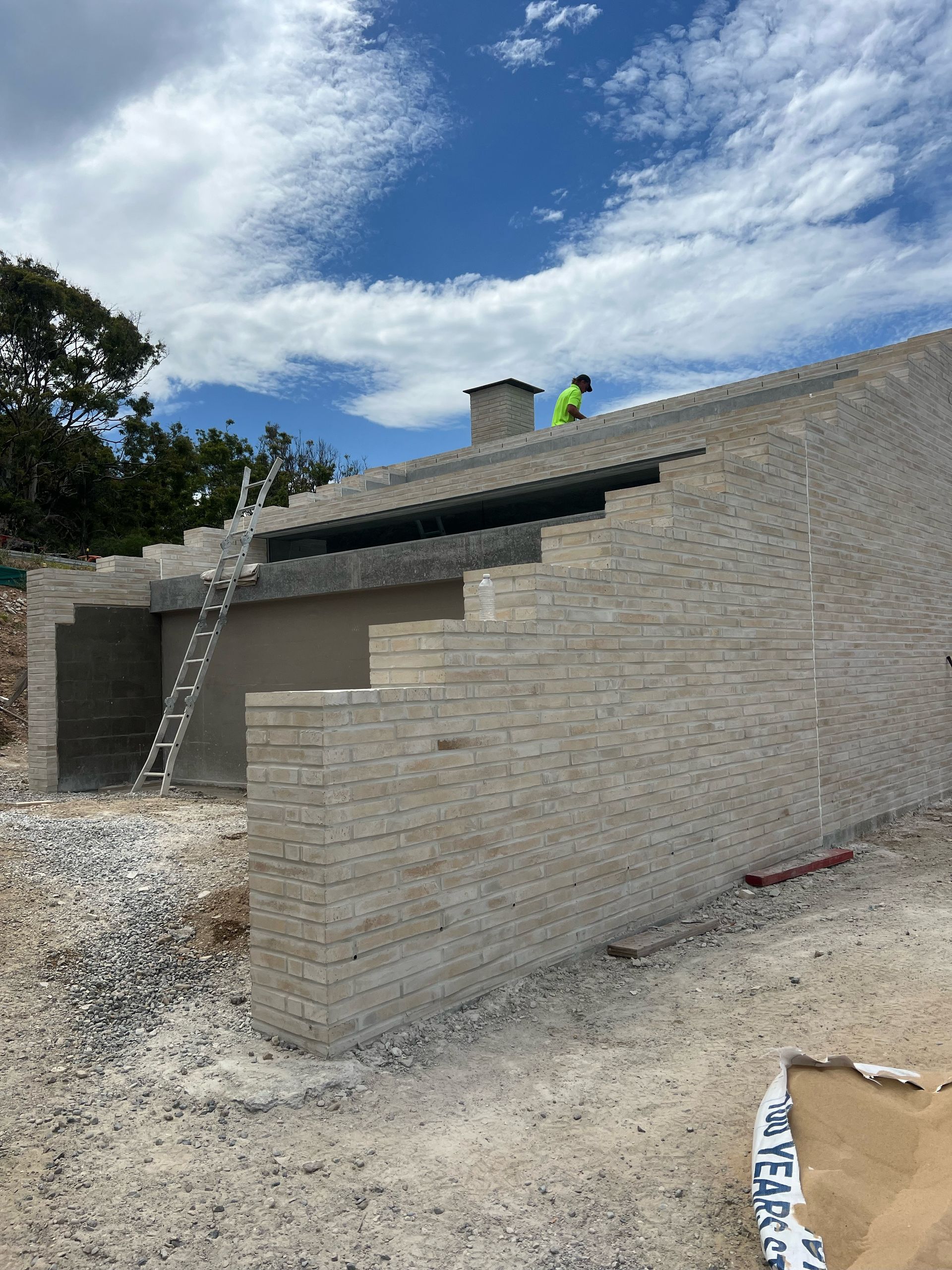 A large building with a lot of windows is being built.