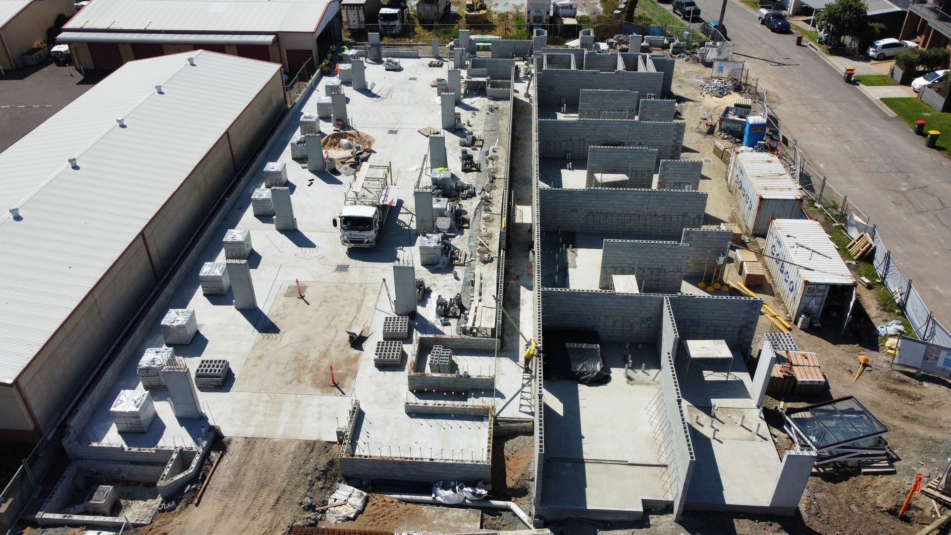 An aerial view of a large building under construction
