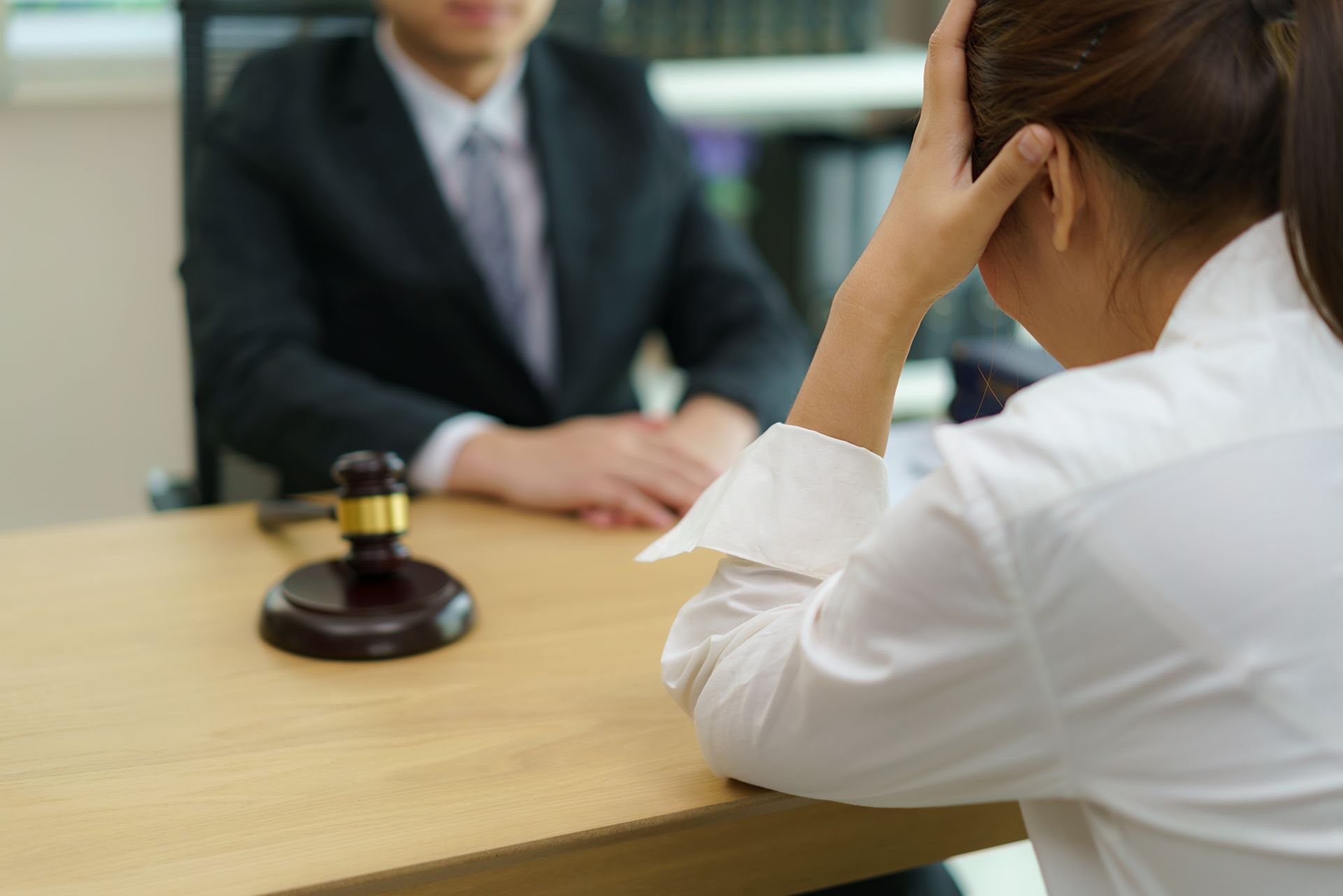 Lawyer having a meeting with a client and providing legal advice