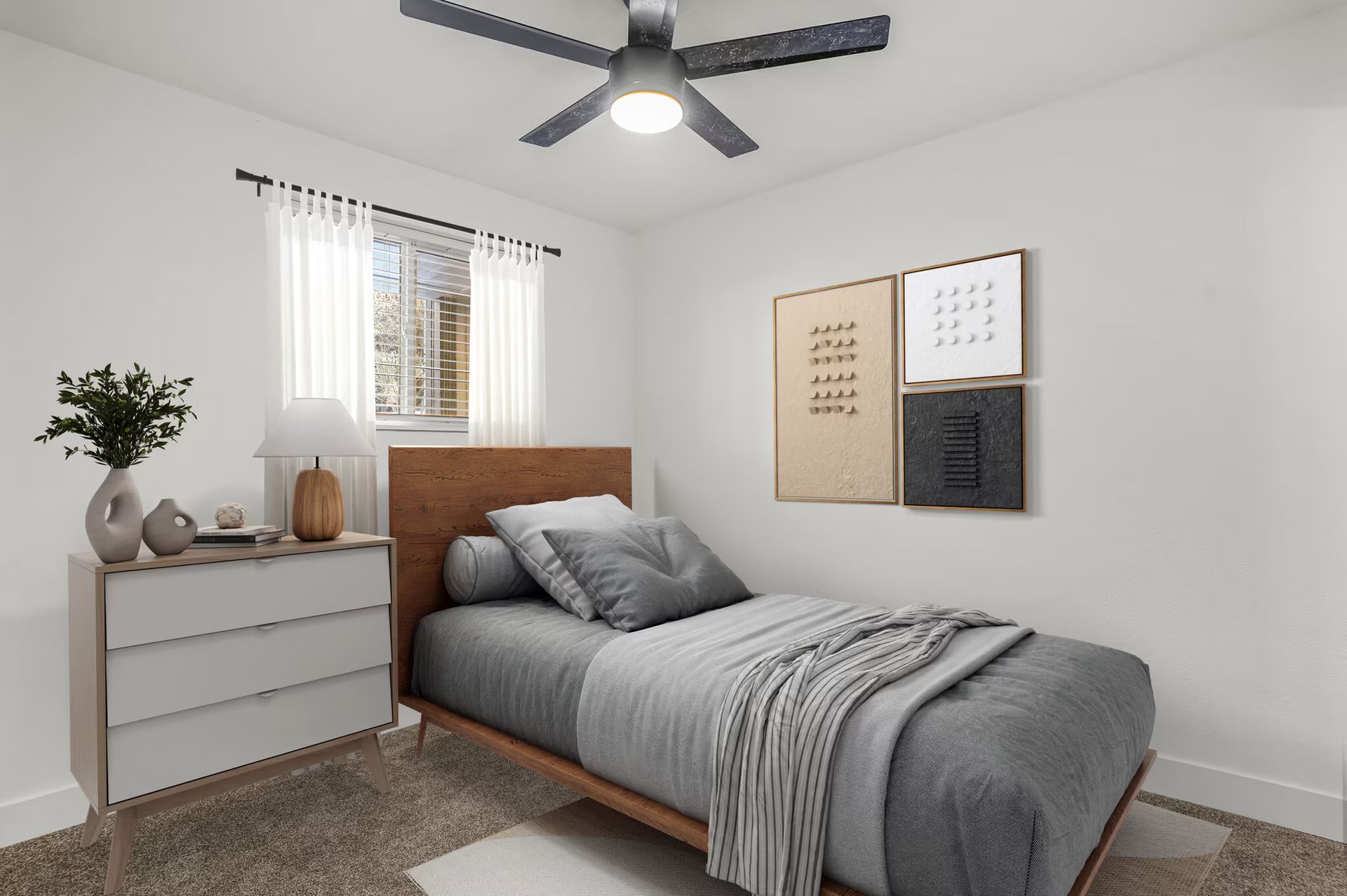 Bedroom with bed, dresser, window, artwork, and ceiling fan. Light gray and brown tones.