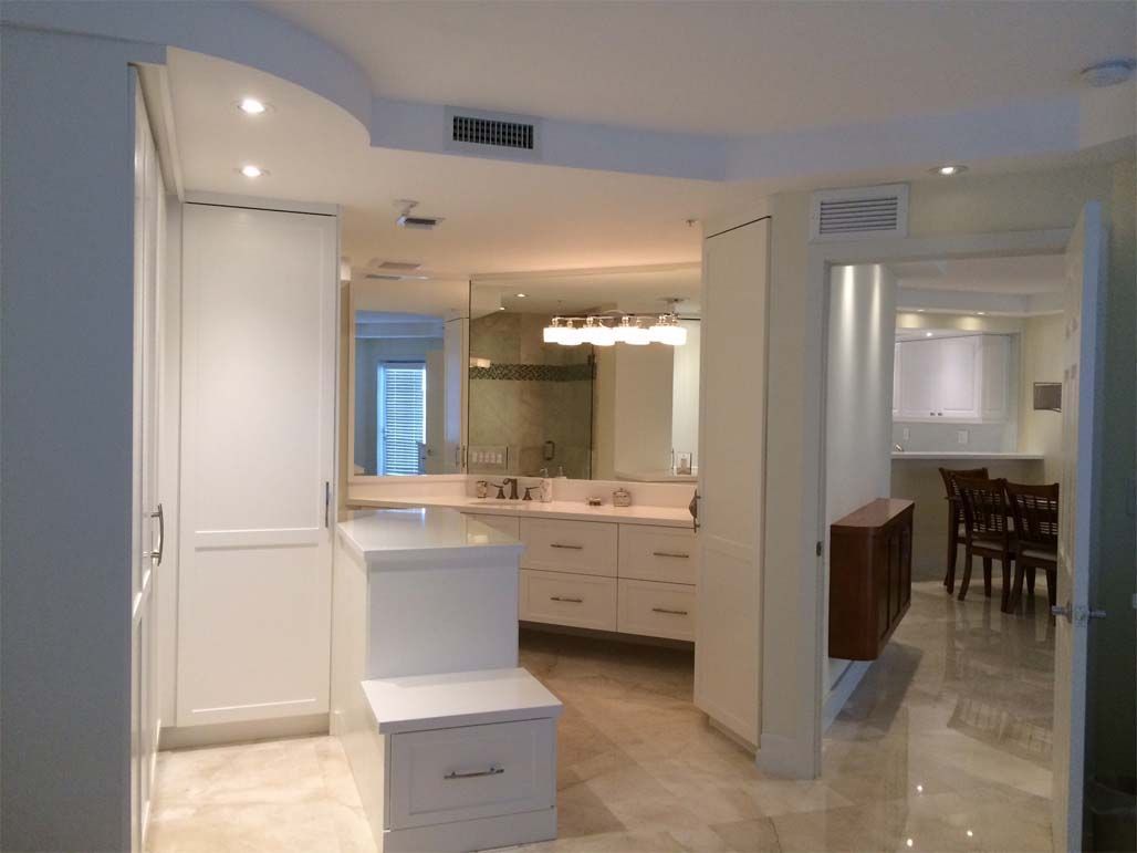 A bathroom with two sinks and a mirror