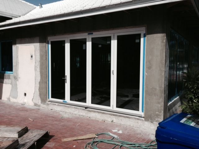 A house with a lot of windows is being built