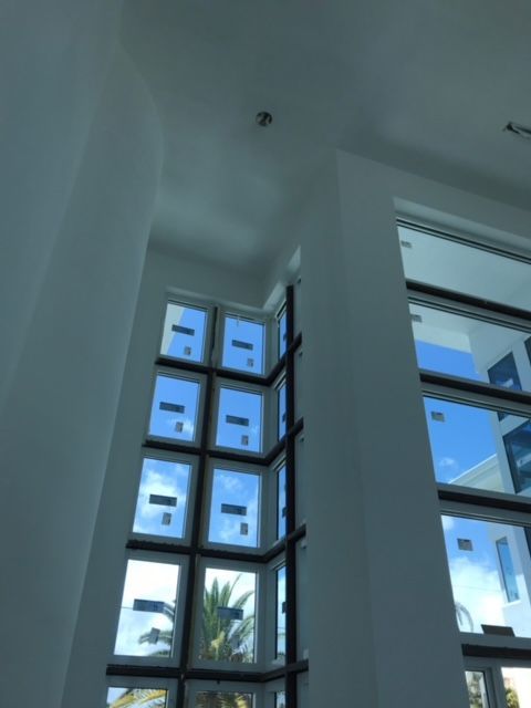 Looking up at a building with a lot of windows