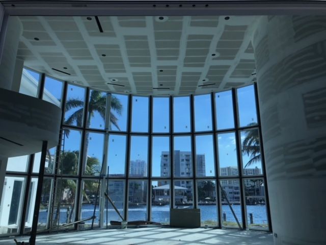 A building under construction with a lot of windows