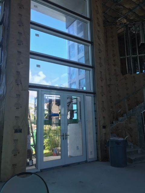 A building under construction with a lot of windows