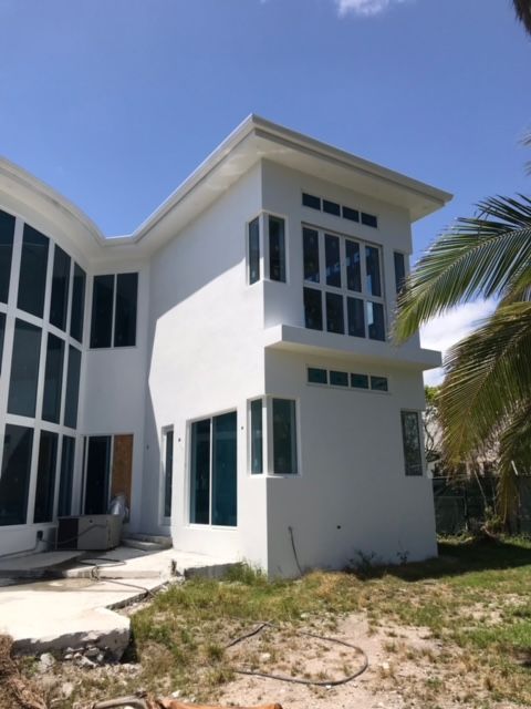 A large white house with a lot of windows