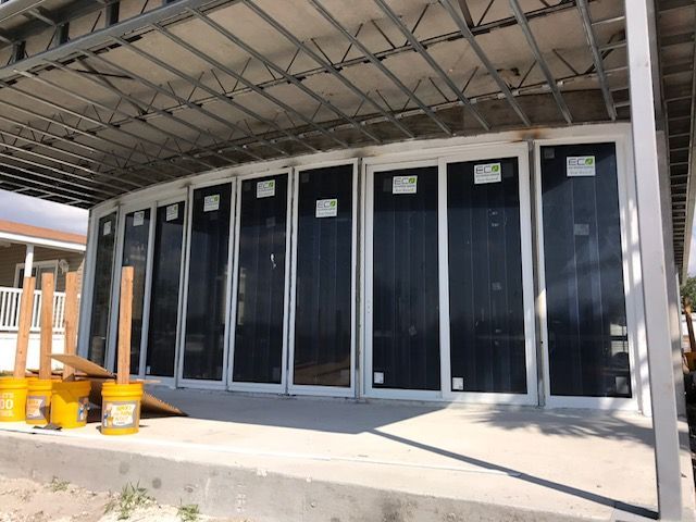 A building under construction with a lot of windows