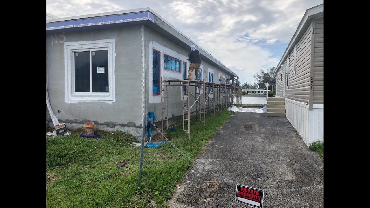 A mobile home is being built in a mobile home park.