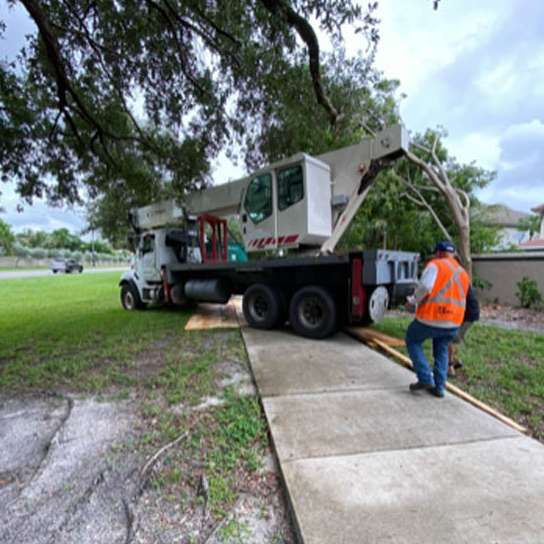 A truck with a crane on the back of it