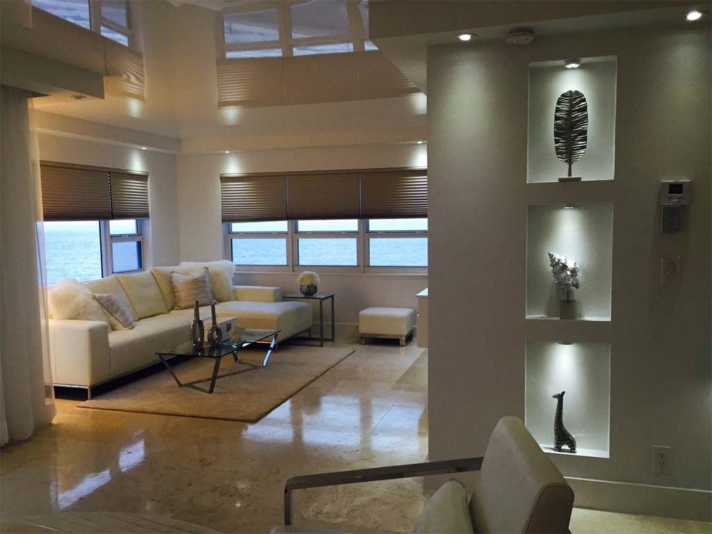 A living room with a couch and a chair