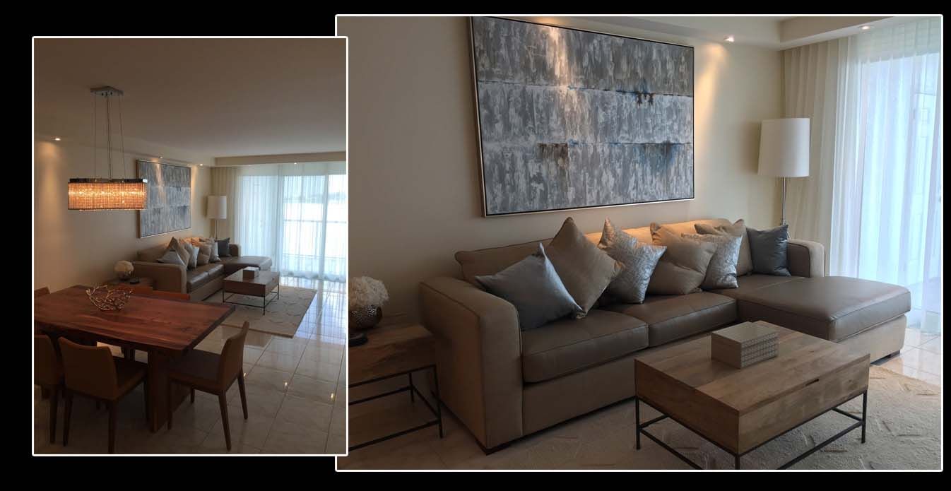 A living room with a couch and a table