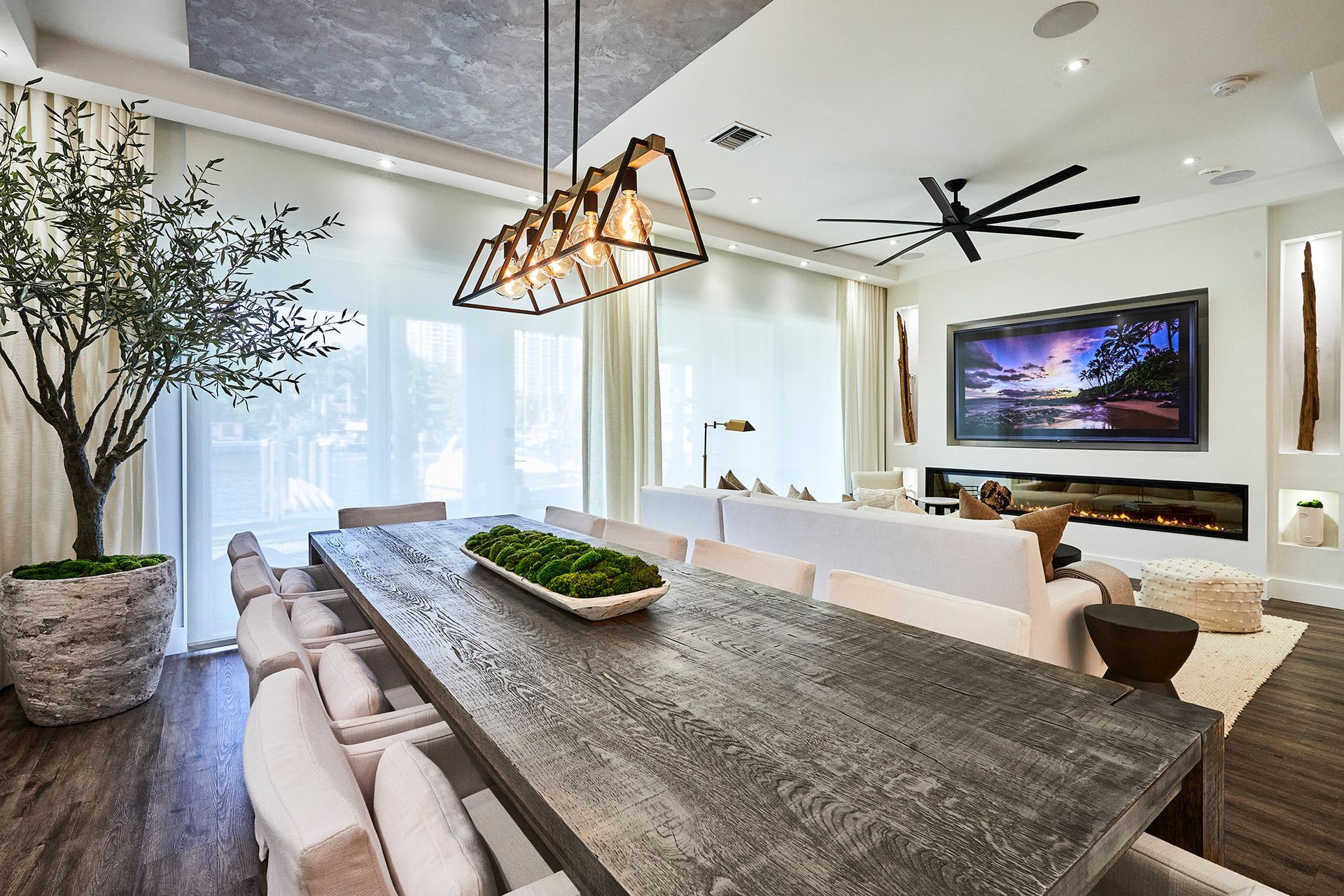 There is a long table in the middle of the room.