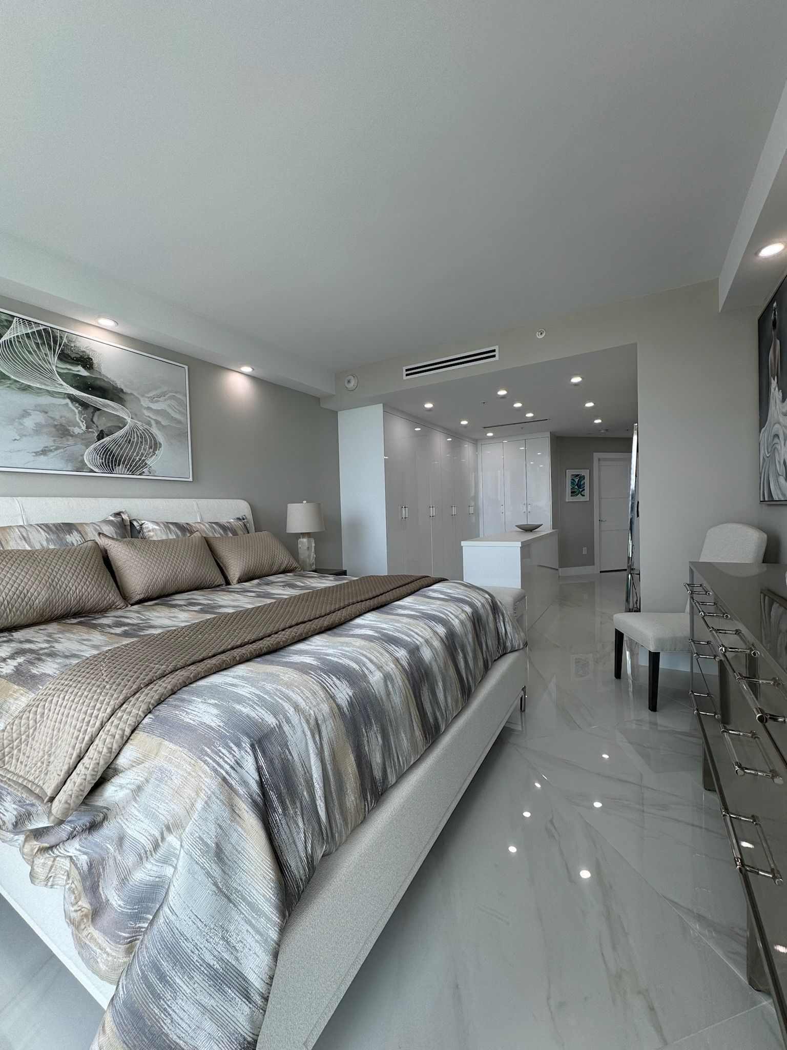 There is a large bed in the middle of the room.