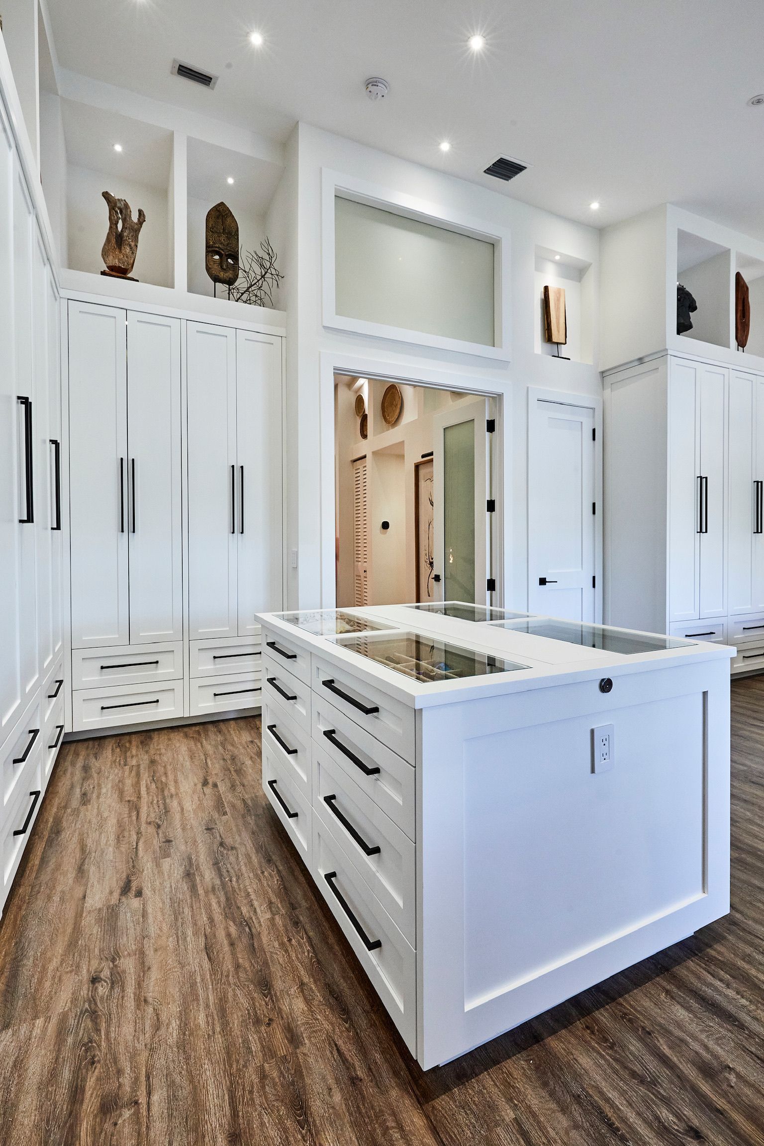 There is a large island in the middle of the kitchen.