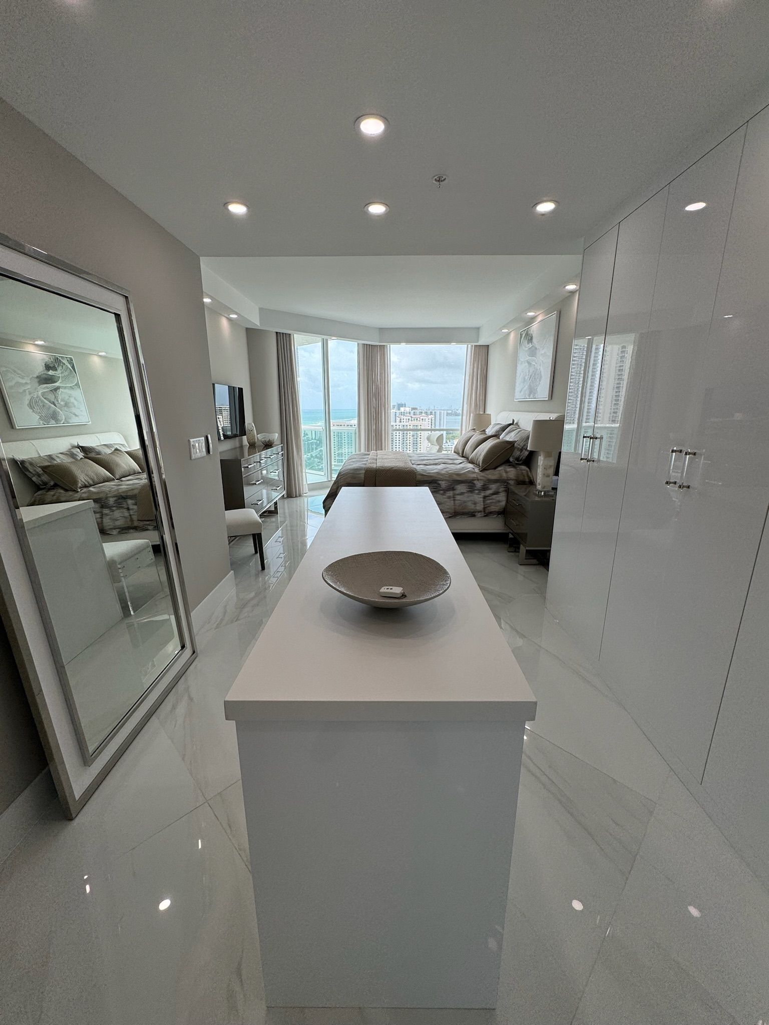 There is a large mirror in the middle of the room.