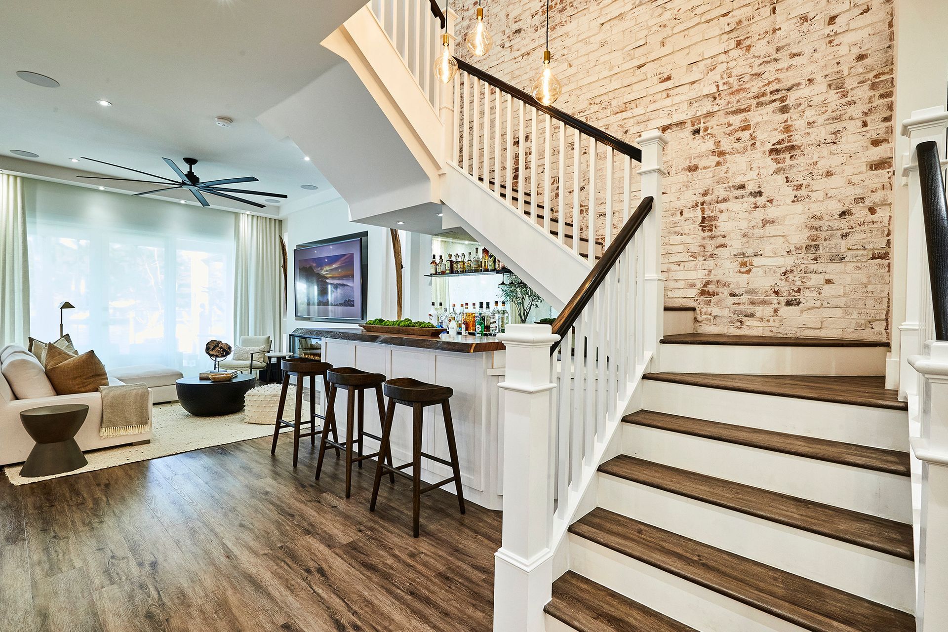 There is a staircase leading up to the second floor of a house.