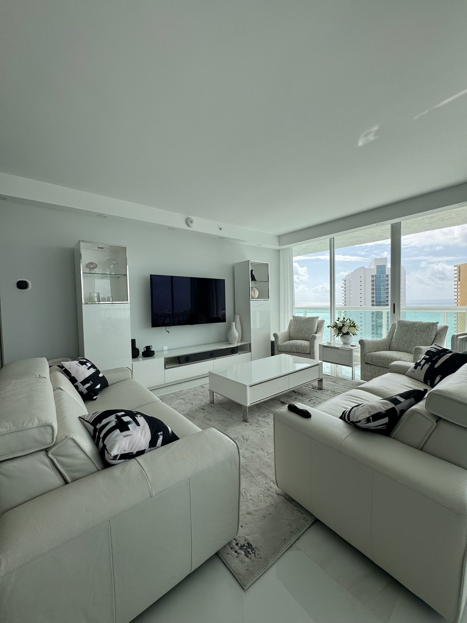 A living room filled with furniture and a flat screen tv.