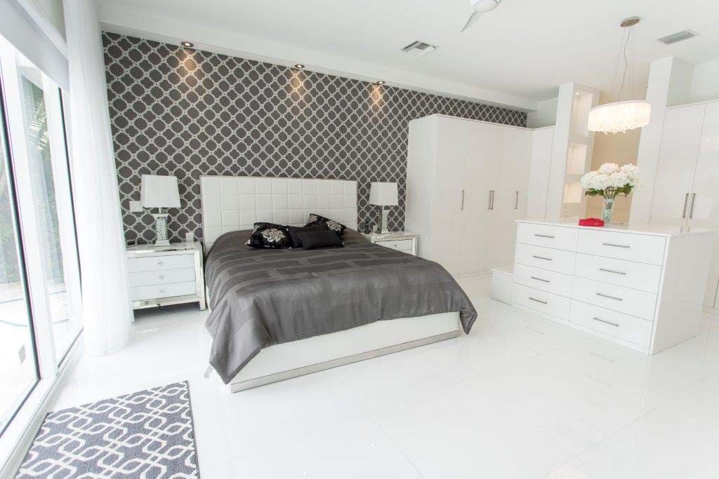 There is a large bed in the middle of the room.