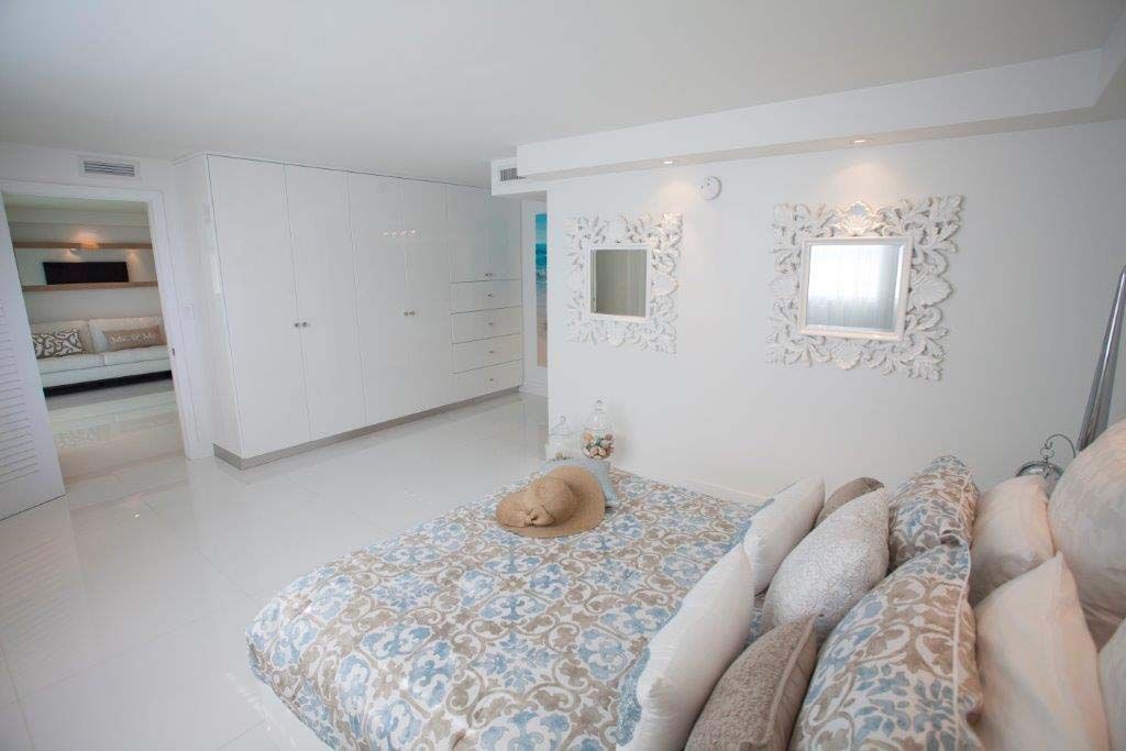 There is a large bed in the middle of the room.