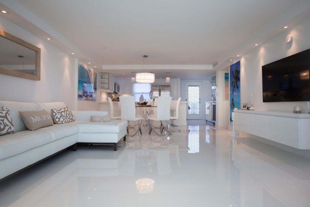 A living room filled with furniture and a flat screen tv.