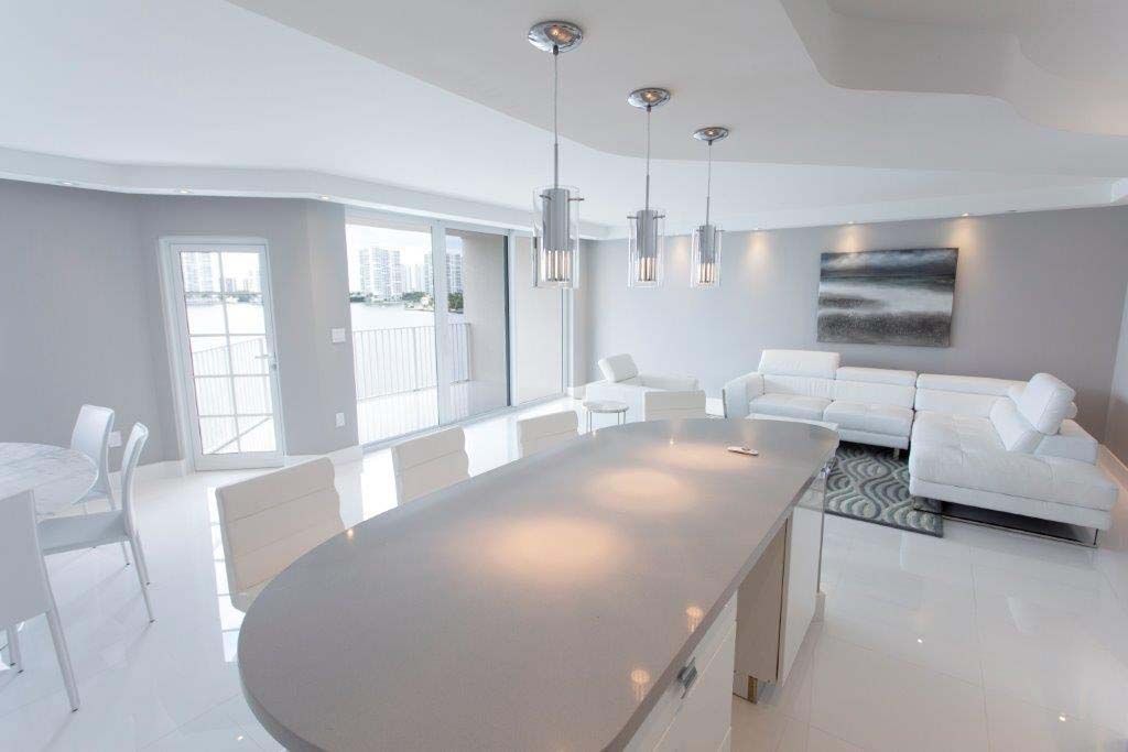 There is a large table in the middle of the room.