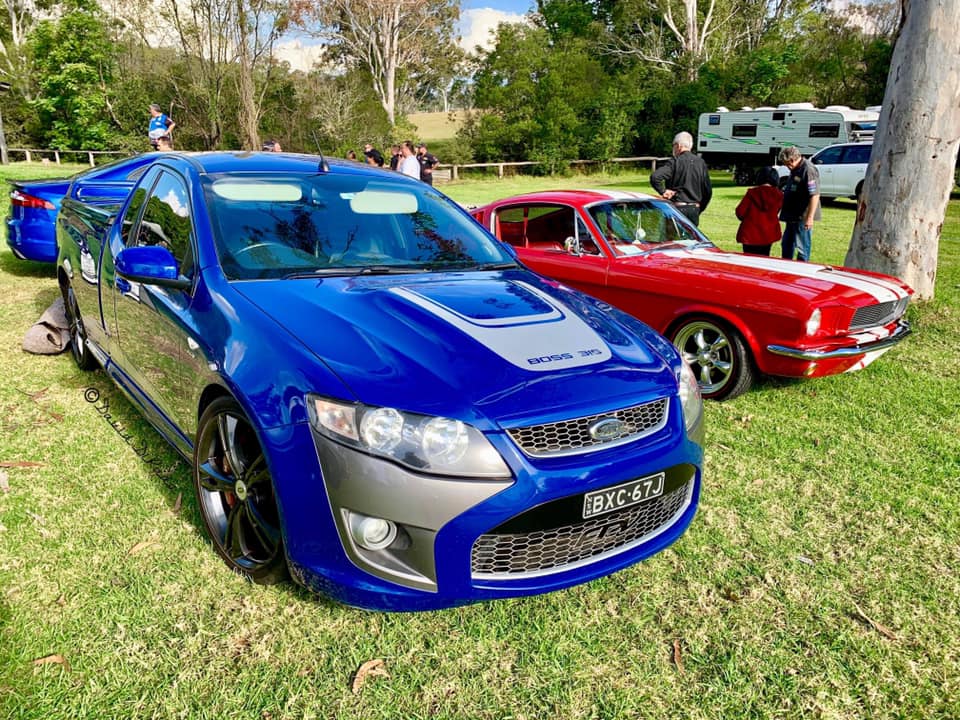 a blue modern Ford car