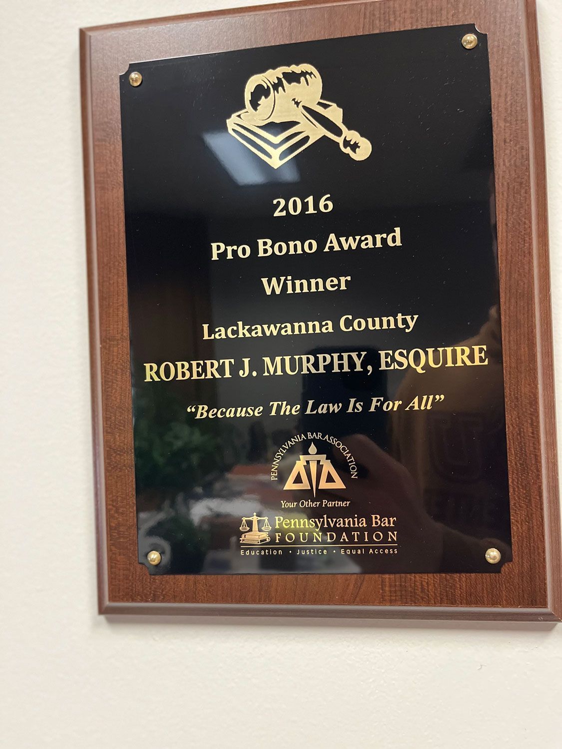 Plaque honoring Robert J. Murphy, Esquire, as 2016 Pro Bono Award winner in Lackawanna County, featuring a gavel logo.
