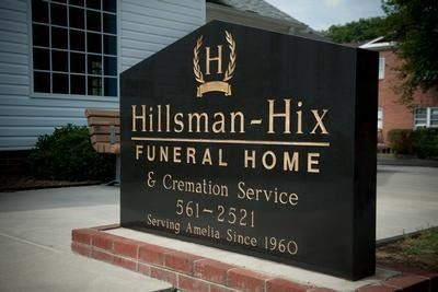 A sign for hillman-hix funeral home and cremation service