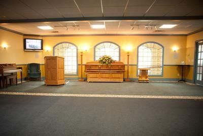 There is a podium in the middle of the room.