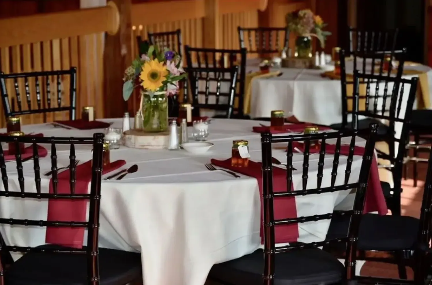 A table with a vase of flowers on it
