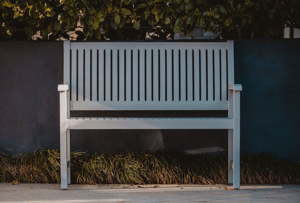 Newly painted gray bench